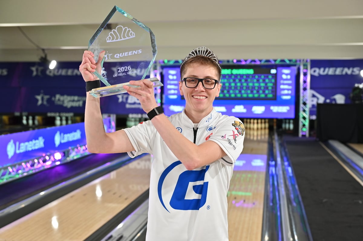 Erin McCarthy holding the 2026 USBC Queens trophy